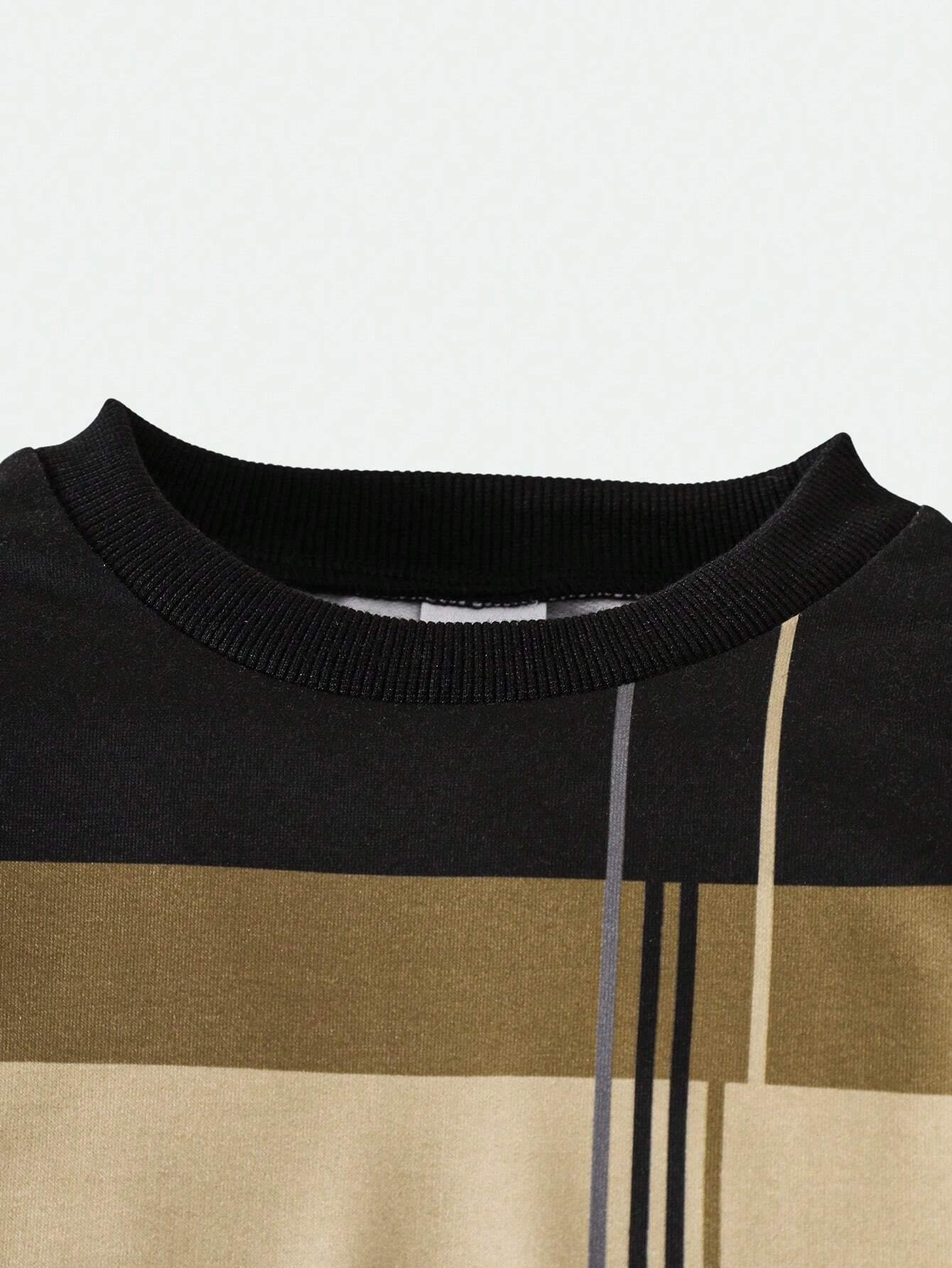 Conjunto negro con estampado geométrico y pantalón largo