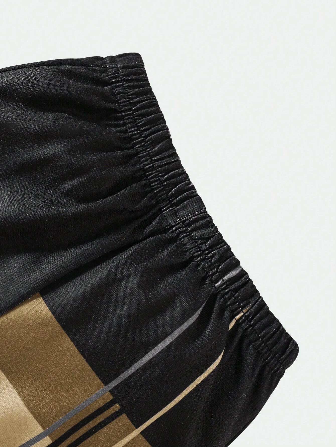 Conjunto negro con estampado geométrico y pantalón largo