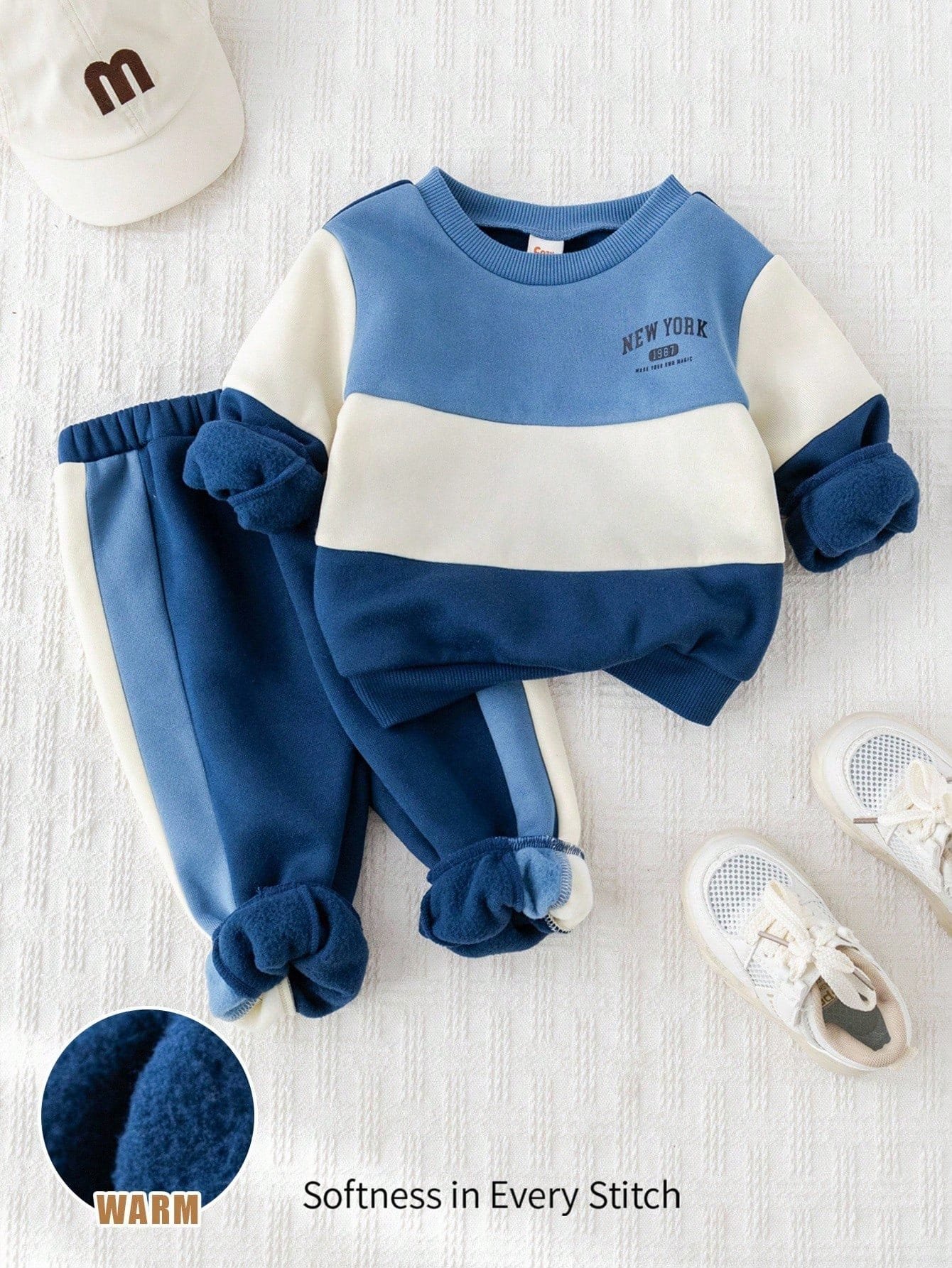 Conjunto azul con suéter cálido y pantalón cómodo para bebé