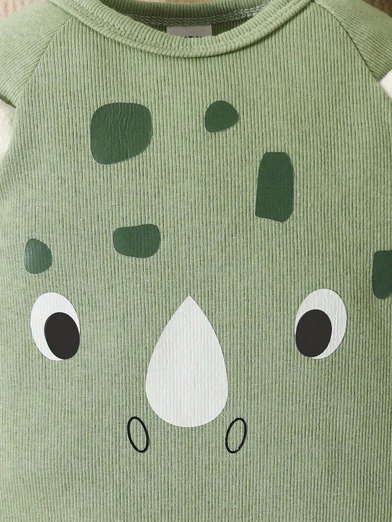 Mameluco verde con diseño 3D de dinosaurio para bebé