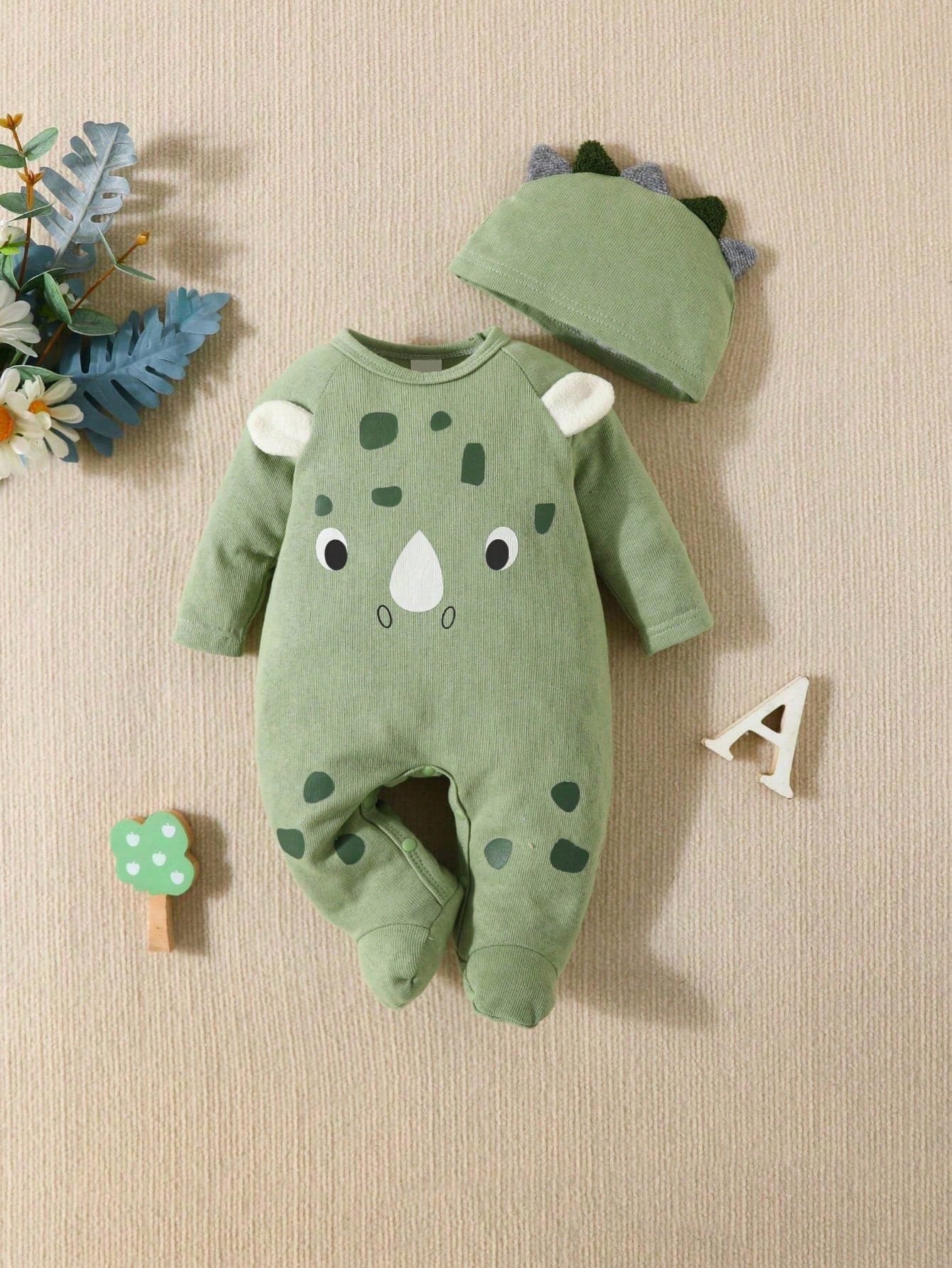 Mameluco verde con diseño 3D de dinosaurio para bebé