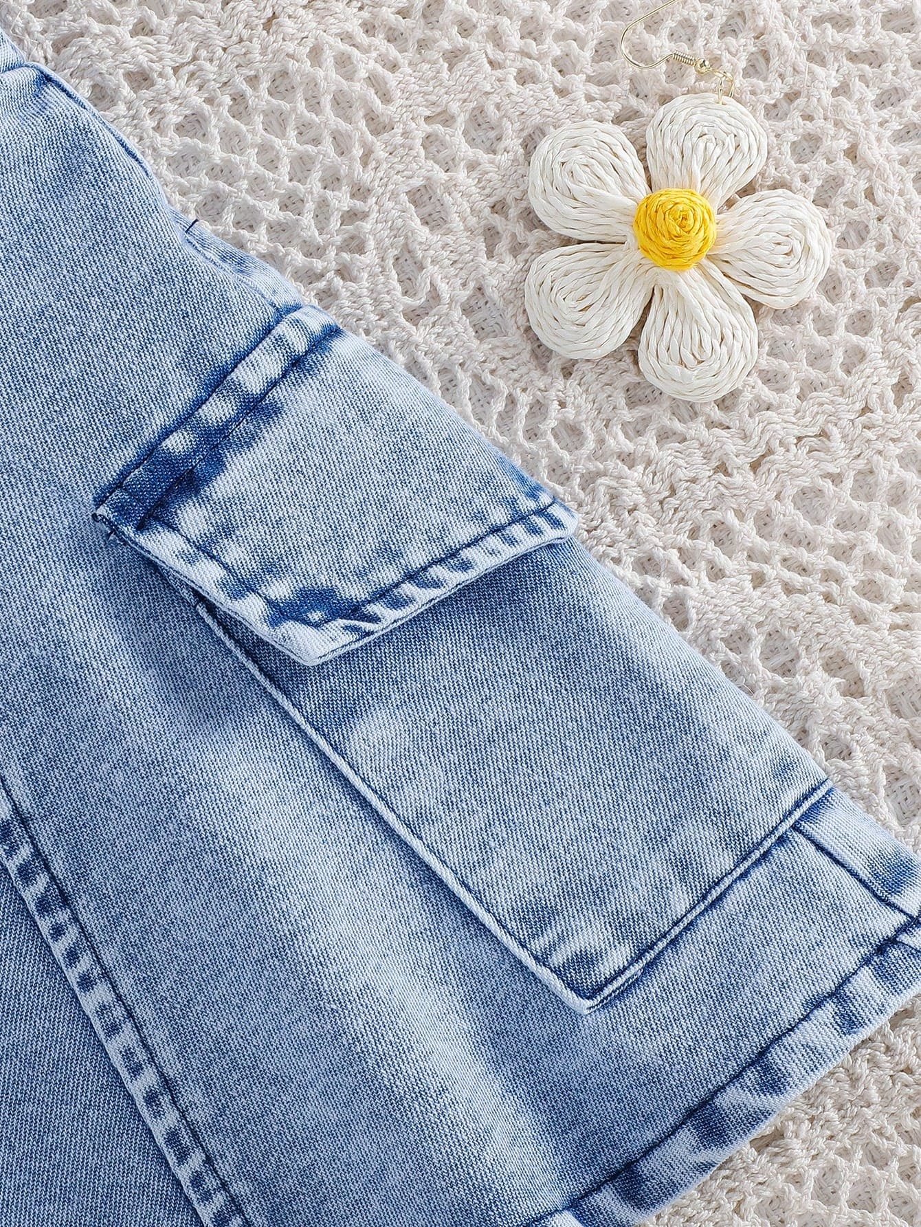 Vestido denim azul con tirantes y bolsillos laterales