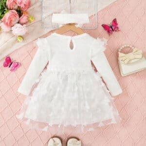 Vestido blanco de tul con mariposas y cuello volante