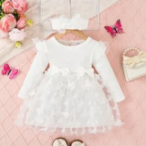 Vestido blanco de tul con mariposas y cuello volante