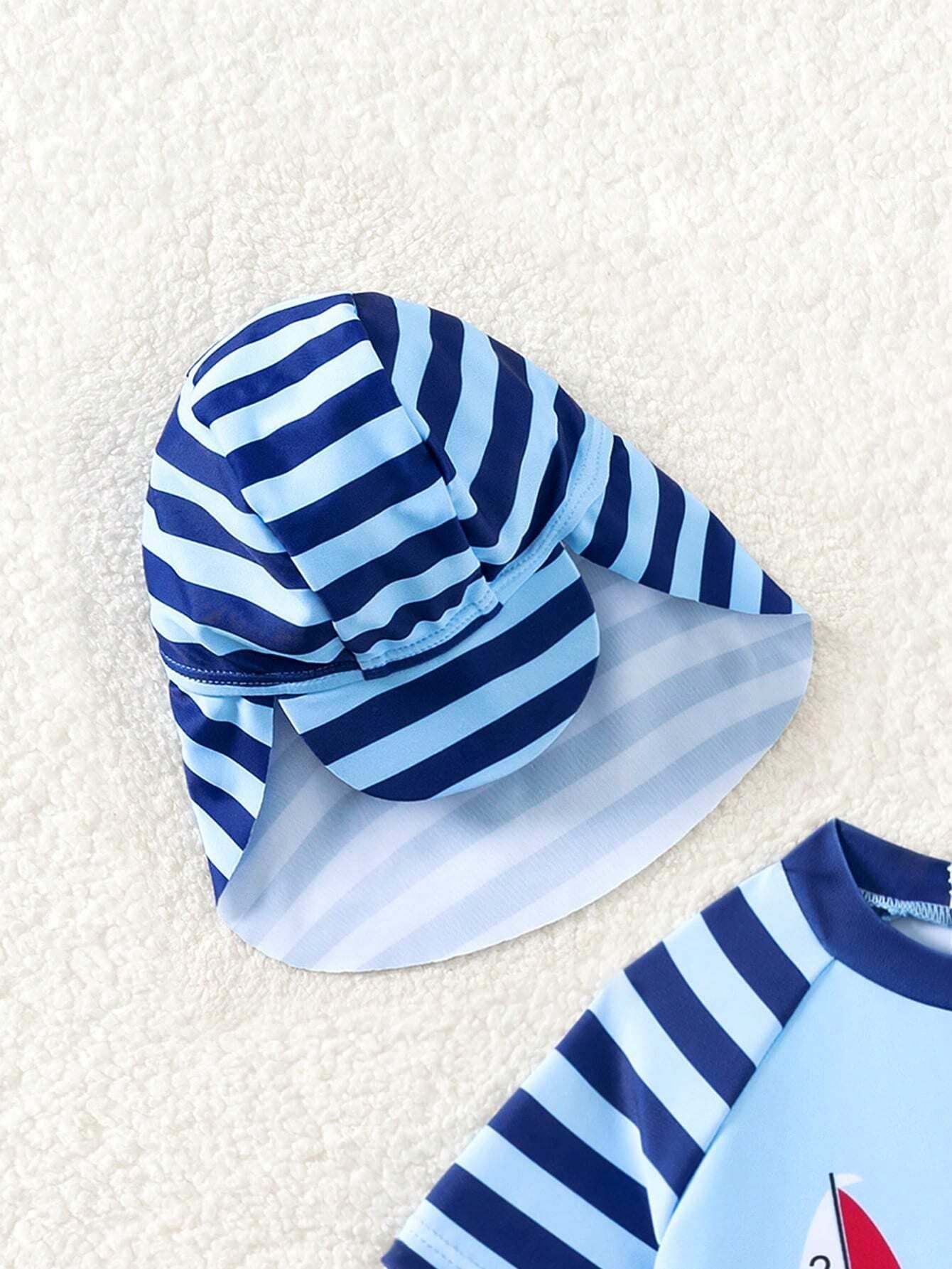 Traje de baño azul barcos rayas