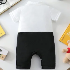 Pelele blanco negro moño elegante minimalista